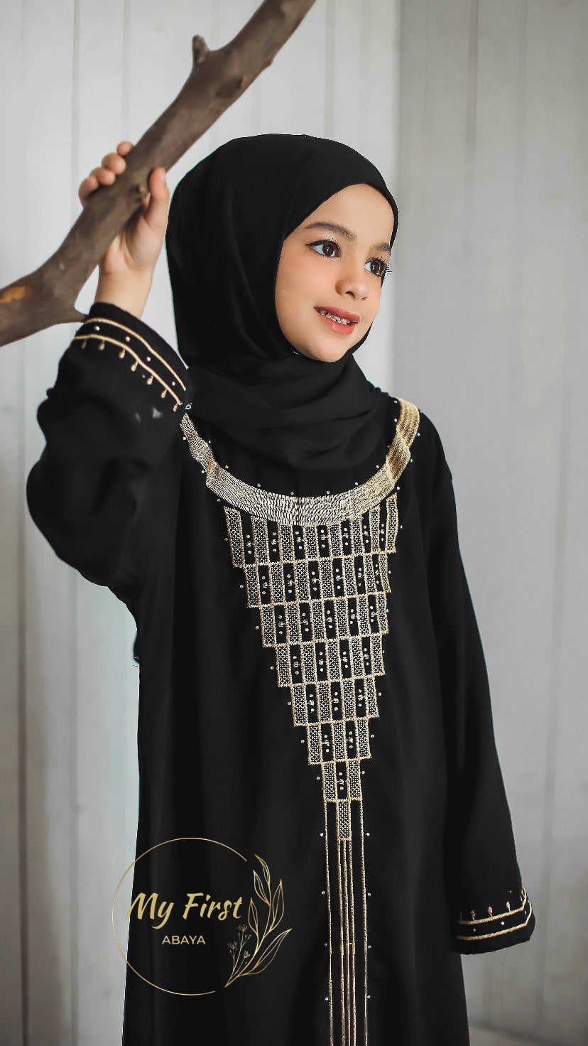 The Fatimah abaya. Modest dress for young girls ages 4 to 12 years of age. Plain black headscarf is included.