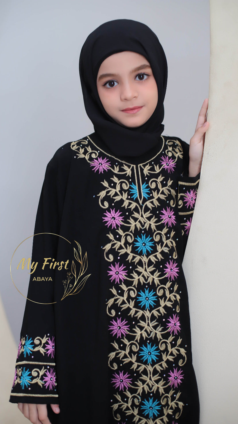 The Safiyya abaya. Modest dress for young girls ages 4 to 12 years of age. Plain black headscarf is included.