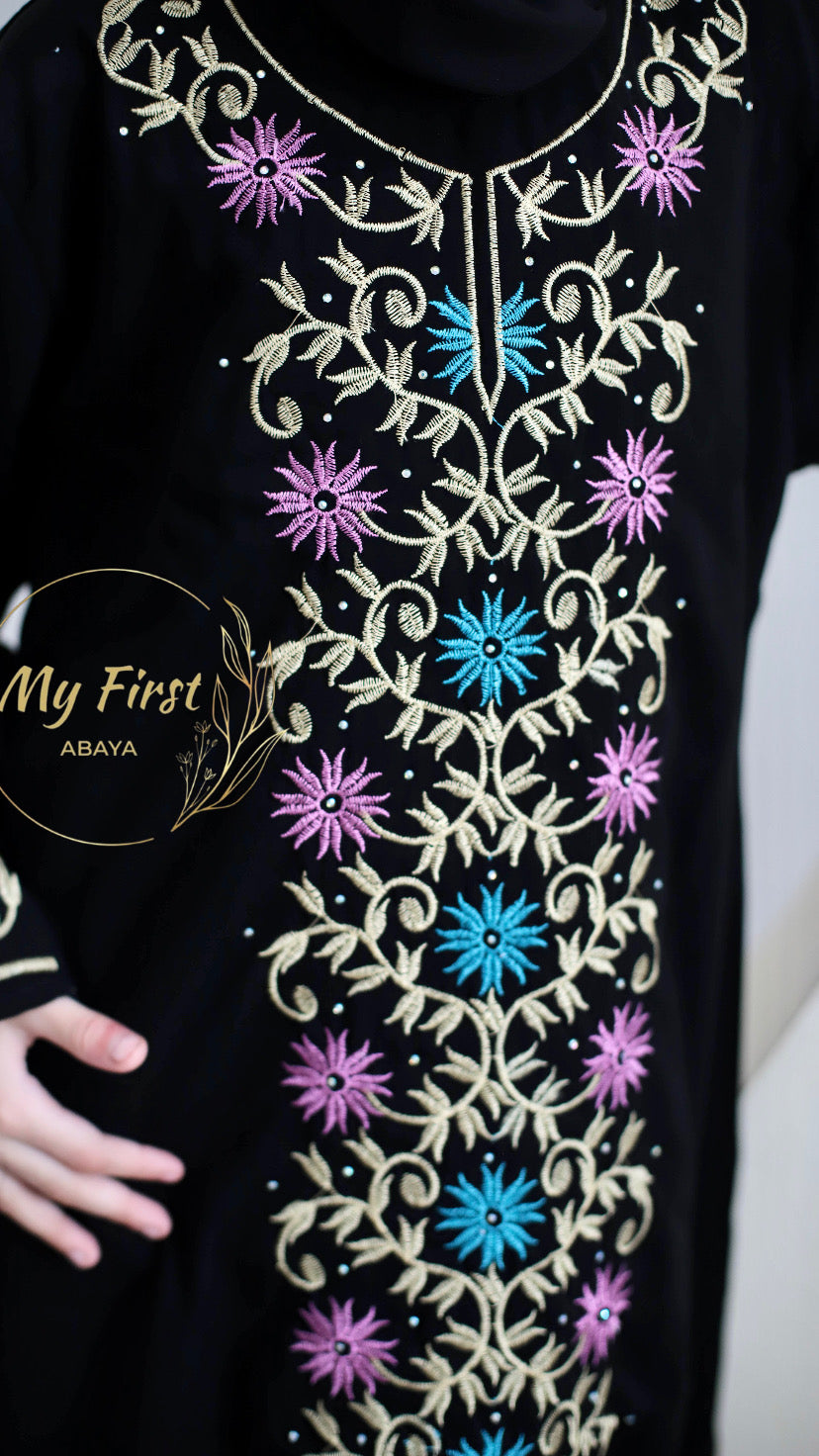 The Safiyya abaya. Modest dress for young girls ages 4 to 12 years of age. Plain black headscarf is included.