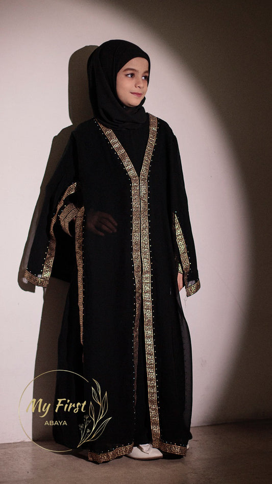 The Aasiyah abaya. Modest dress for young girls. Ages 4 to 12 years of age. Plain black headscarf is included.