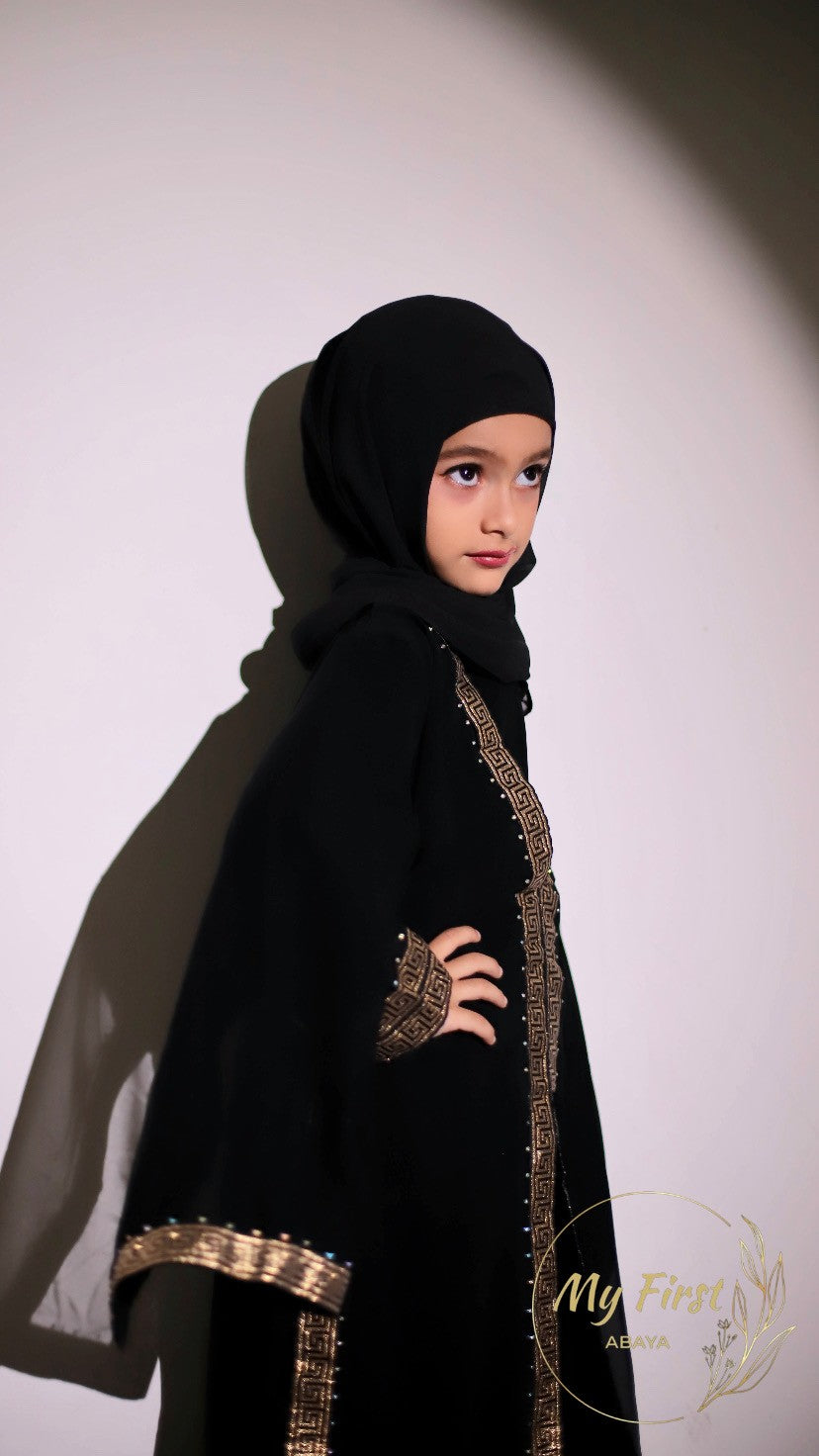 The Aasiyah abaya. Modest dress for young girls. Ages 4 to 12 years of age. Plain black headscarf is included.
