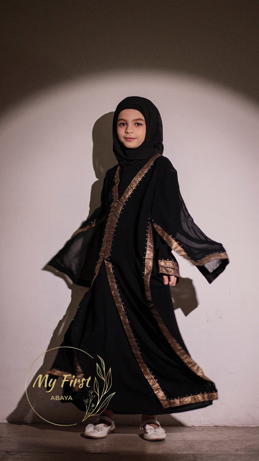 The Aasiyah abaya. Modest dress for young girls. Ages 4 to 12 years of age. Plain black headscarf is included.