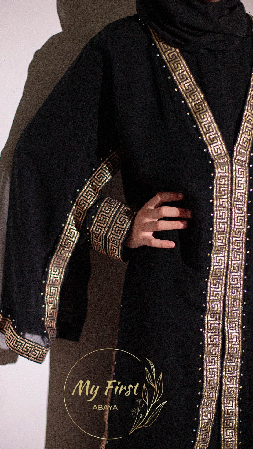 The Aasiyah abaya. Modest dress for young girls. Ages 4 to 12 years of age. Plain black headscarf is included.
