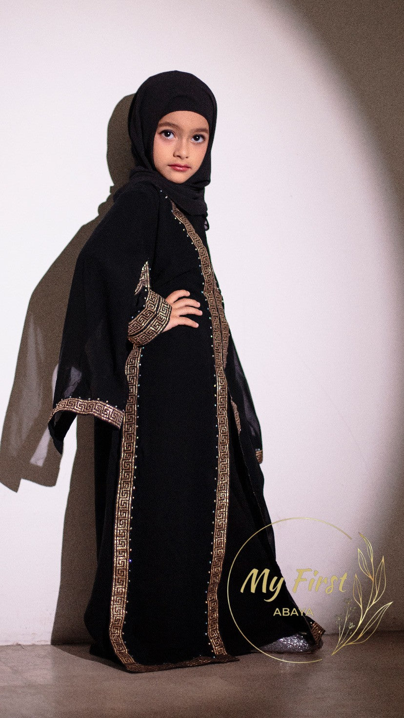 The Aasiyah abaya. Modest dress for young girls. Ages 4 to 12 years of age. Plain black headscarf is included.
