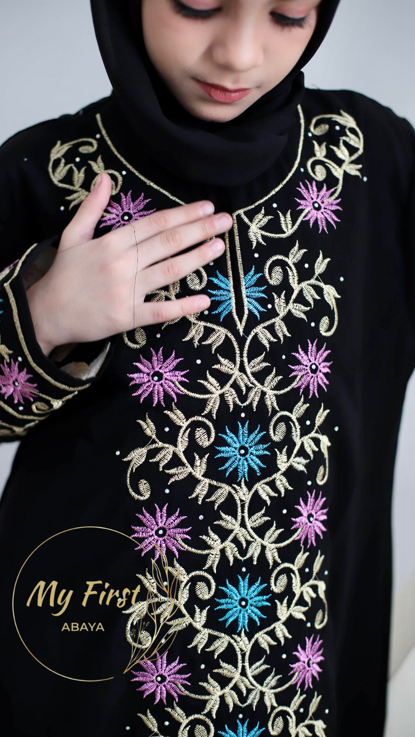 The Safiyya abaya. Modest dress for young girls ages 4 to 12 years of age. Plain black headscarf is included.