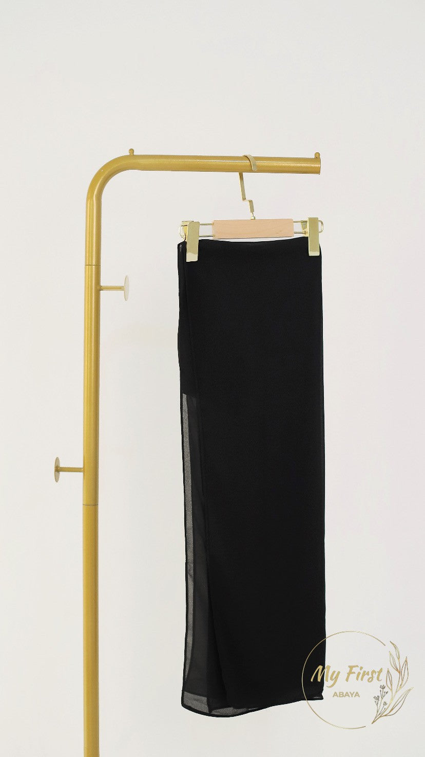 The Aisyah abaya. Modest black abaya dress for young girls ages 4 to 12 years of age. Plain black headscarf is included.