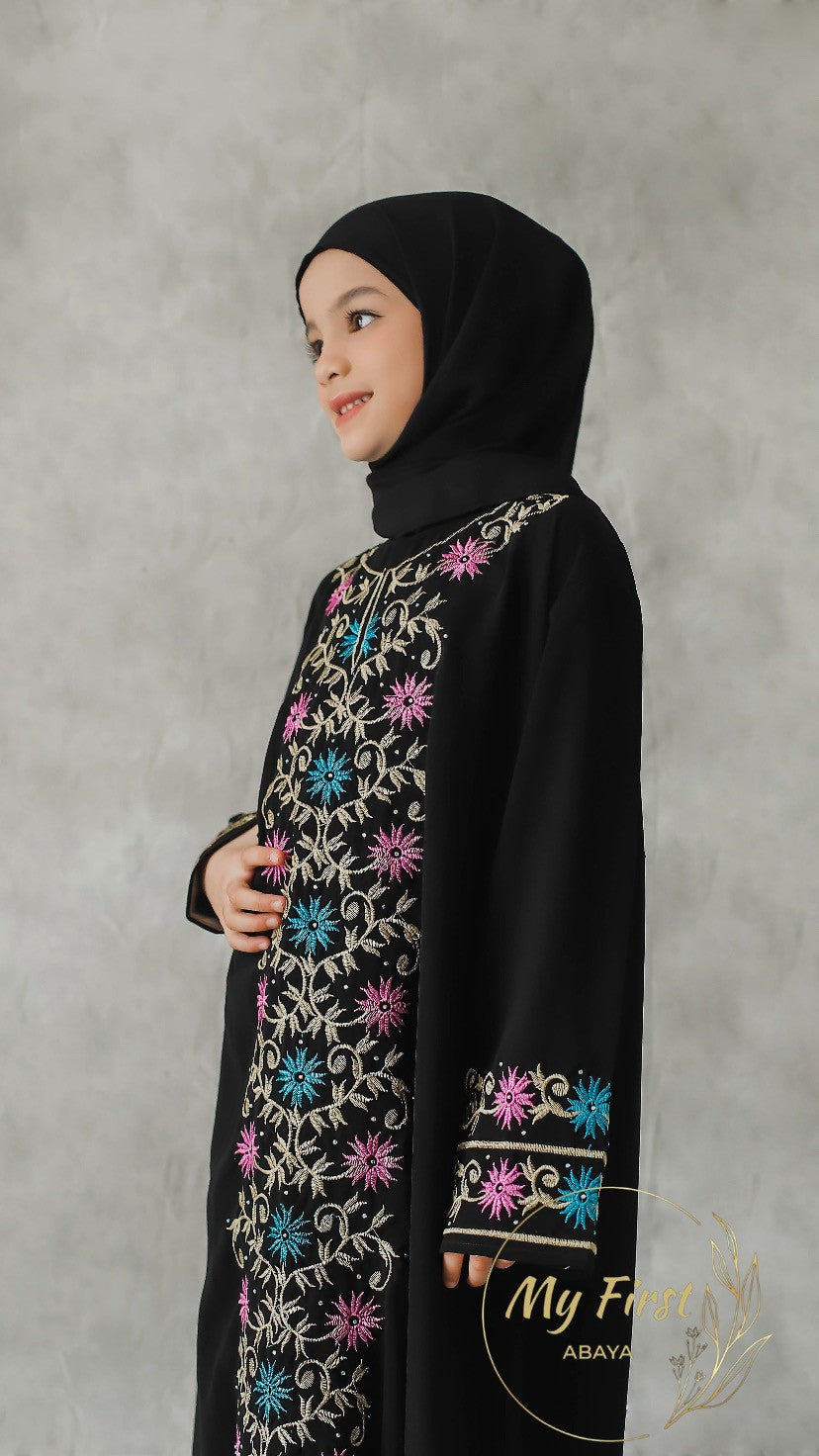 The Safiyya abaya. Modest dress for young girls ages 4 to 12 years of age. Plain black headscarf is included.