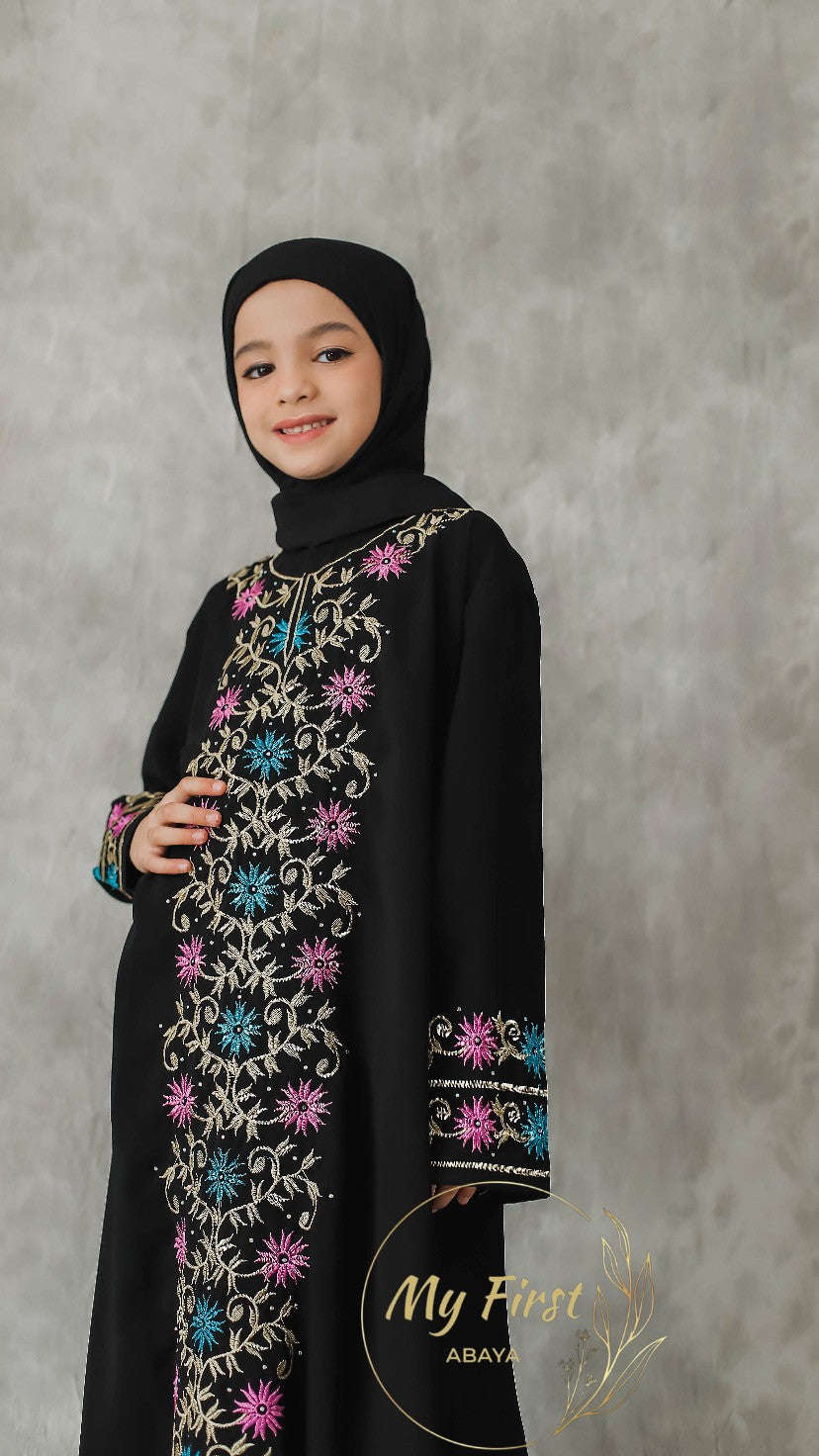 The Safiyya abaya. Modest dress for young girls ages 4 to 12 years of age. Plain black headscarf is included.
