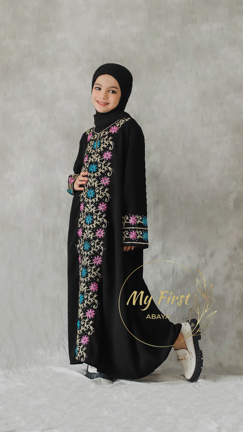 The Safiyya abaya. Modest dress for young girls ages 4 to 12 years of age. Plain black headscarf is included.
