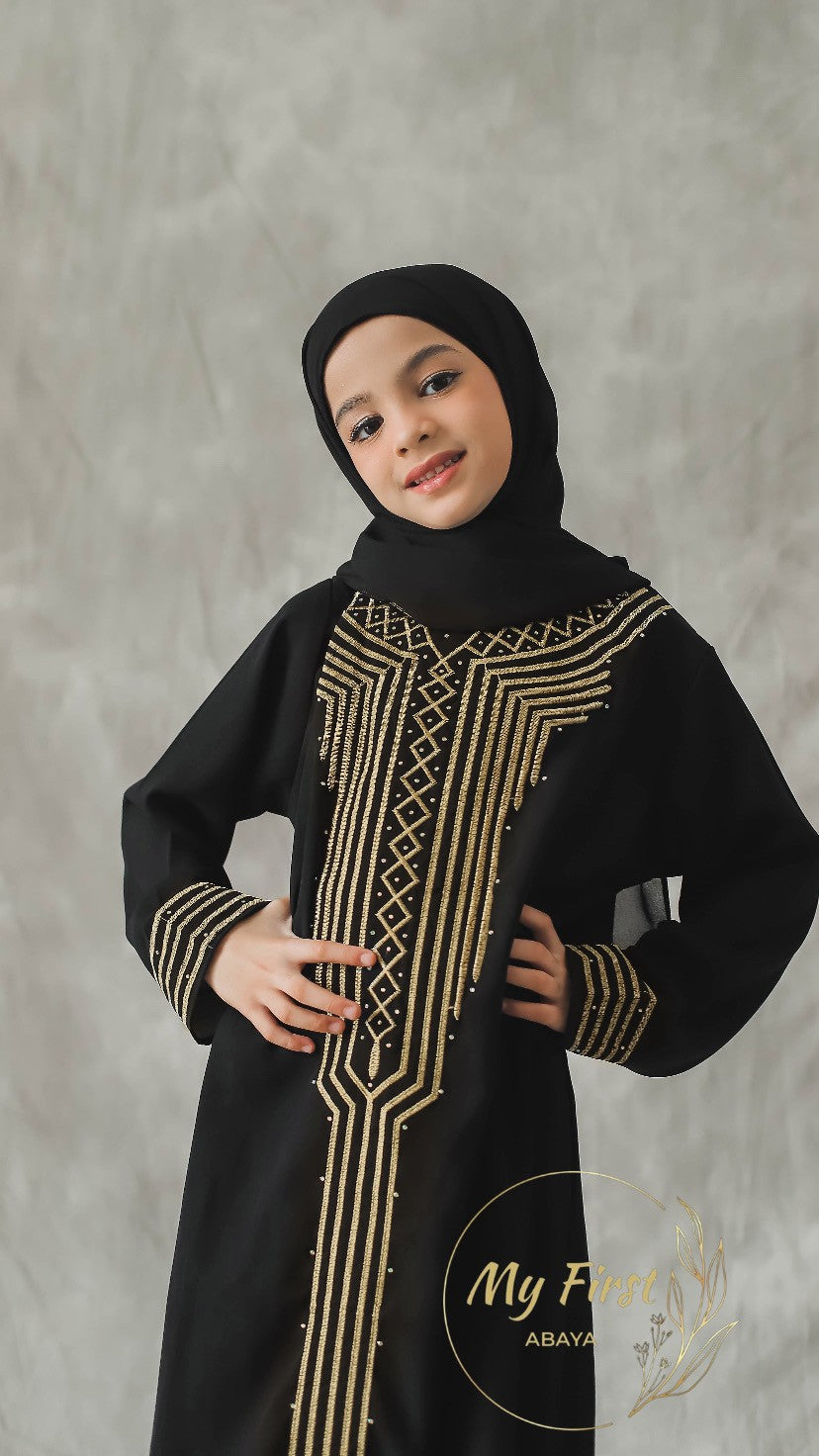 The Zainab abaya. Modest dress for young girls ages 4 to 12 years of age. Plain black headscarf is included.