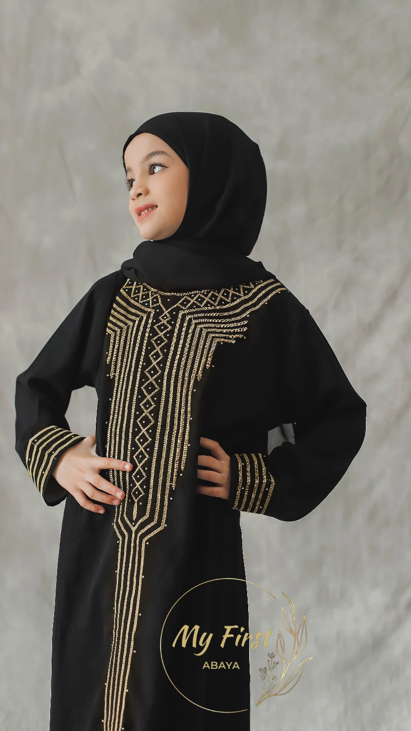 The Zainab abaya. Modest dress for young girls ages 4 to 12 years of age. Plain black headscarf is included.