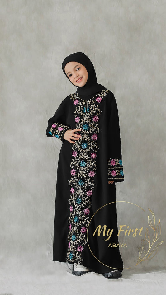 The Safiyya abaya. Modest dress for young girls ages 4 to 12 years of age. Plain black headscarf is included.