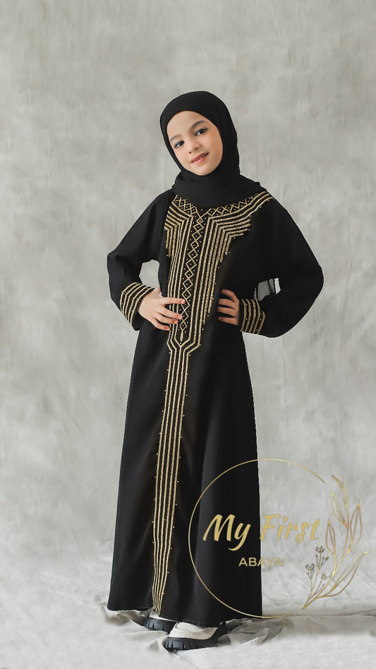 The Zainab abaya. Modest dress for young girls ages 4 to 12 years of age. Plain black headscarf is included.